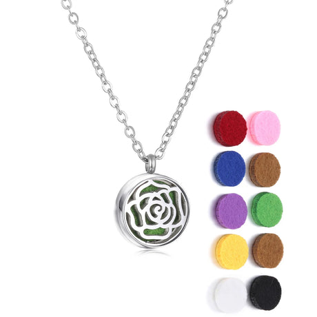 Silver necklace with a rose-shaped pendant and colorful felt pads on a white background