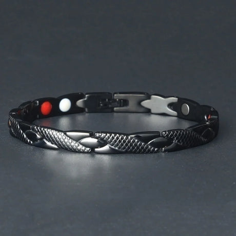 Black braided bracelet on a dark gray background