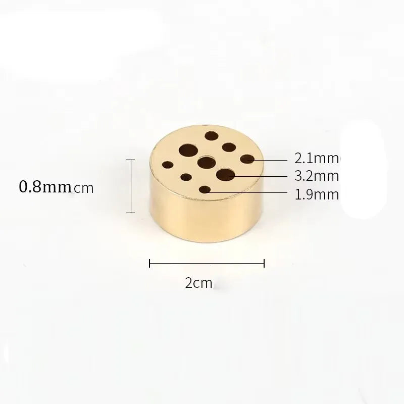 Gold-colored cylindrical object with holes and measurements on a white background