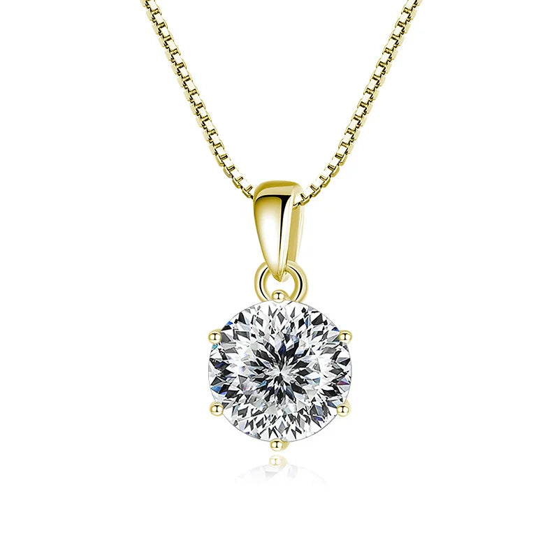 Gold pendant with a large diamond on a white background