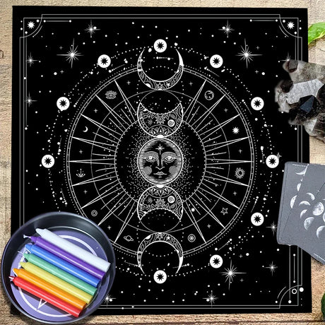 Black and white celestial design with rainbow markers on a wooden surface