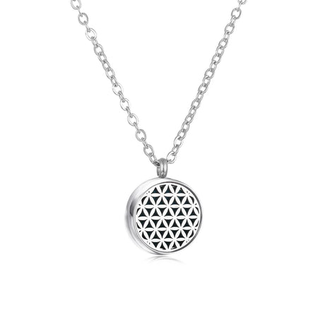 Silver necklace with a round pendant featuring a flower of life design on a white background