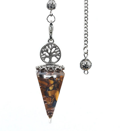 Crystal pendulum with tree of life design on a white background