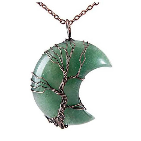 Green stone pendant with tree design on a white background
