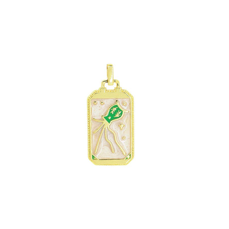 Gold pendant with a green design on a white background