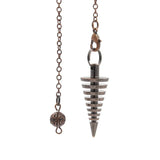 Metal fishing weight with chain on a white background