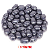 Collection of gray metallic stones on a white background with 'Terahertz' label.