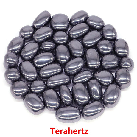 Collection of gray metallic stones on a white background with 'Terahertz' label.