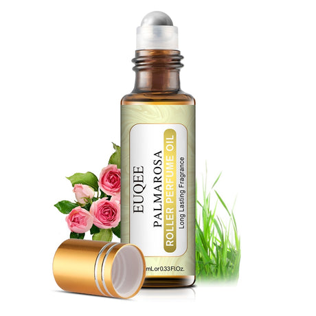 EUQEE Palmarosa Roller Perfume Oil with roses and grass on a white background