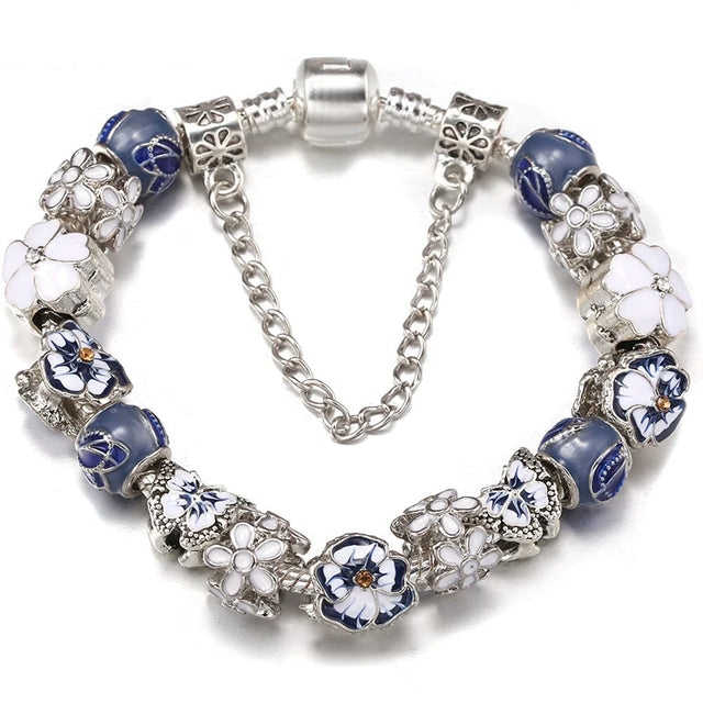 Bracelet with floral beads and silver chain on a white background, featuring the brand 'BAOPON'.