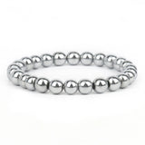 Silver beaded bracelet on a white background