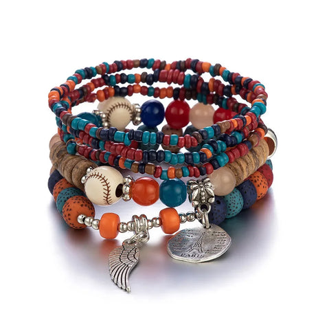 Stack of colorful beaded bracelets with various charms on a white background