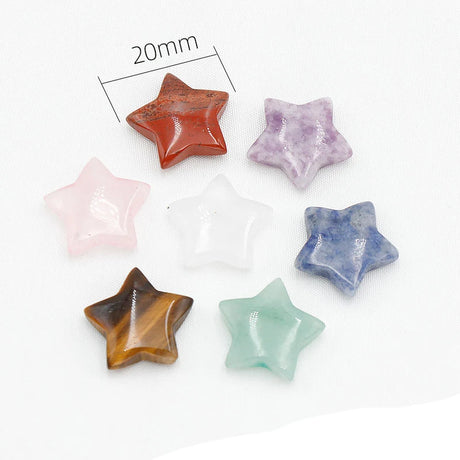 Star-shaped stones in various colors on a white background with a measurement label.