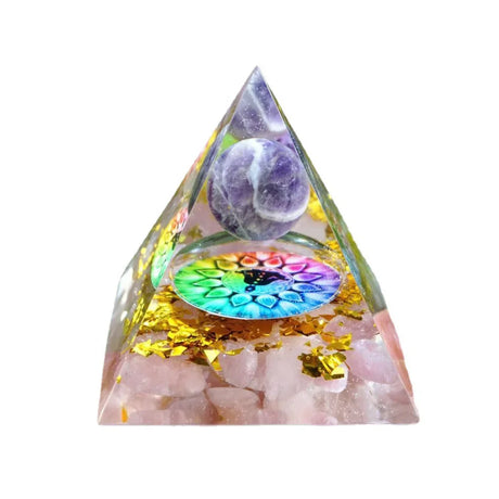 Triangular crystal with colorful interior and gemstones on a white background
