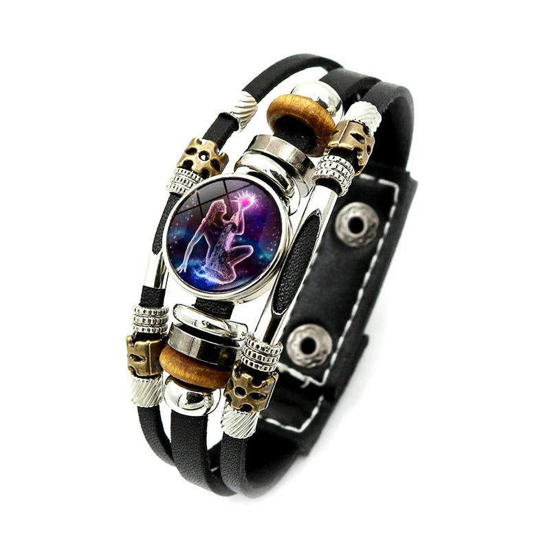 Multicolored beaded bracelet with a central circular design on a white background