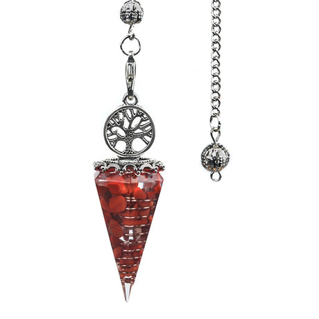 Red crystal pendulum with silver tree of life design on a white background