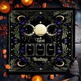 Decorative mat with tarot card design and candles on a wooden surface