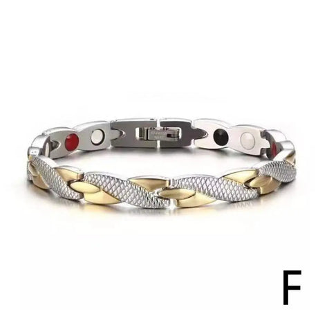 Bracelet with metal links and colored stones on a white background