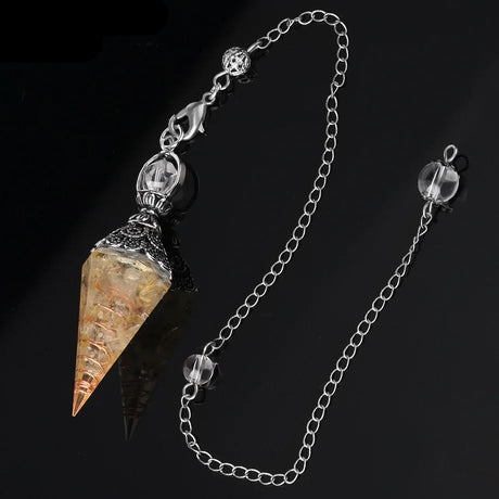 Crystal pendant necklace with chain on a black background