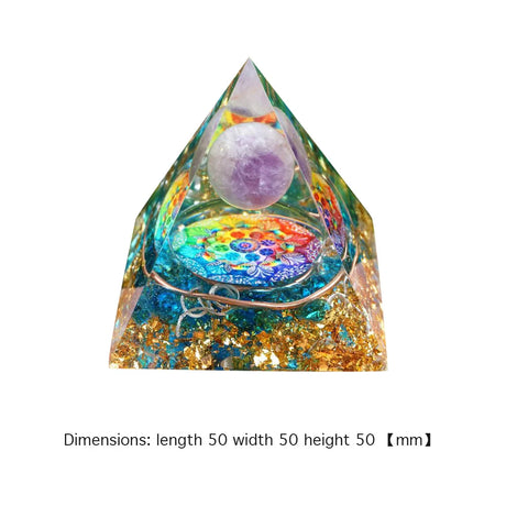Colorful pyramid-shaped object with a multicolored base and a purple sphere on a white background.