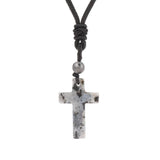 Necklace with a cross pendant and gray cord on a white background