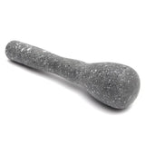 Gray speckled pestle on a white background