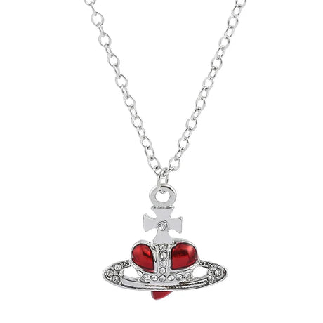Necklace with a red heart pendant and silver chain on a white background