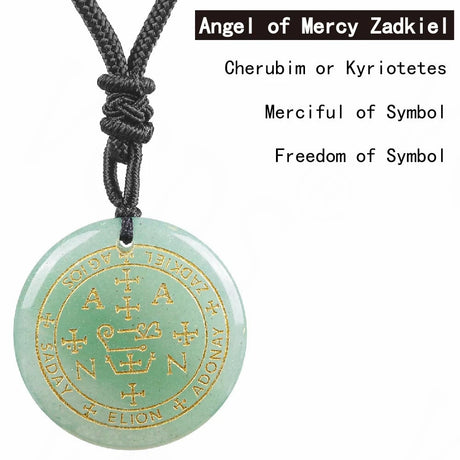 Necklace with a green pendant featuring gold symbols and text on a white background.