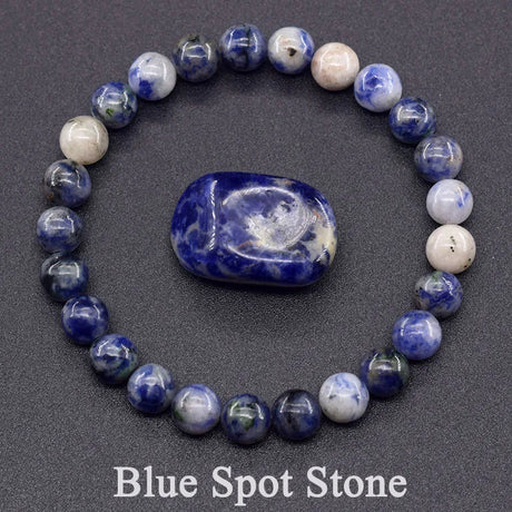 Beaded bracelet with a central blue stone on a dark background, labeled 'Blue Spot Stone'.