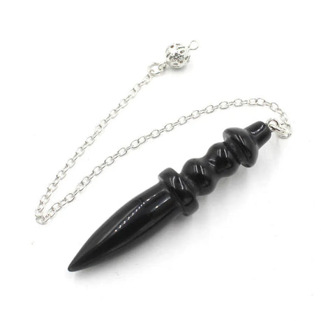 Black dagger-shaped object on a silver chain against a white background
