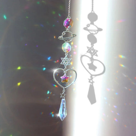 Decorative hanging ornament with crystals and star-shaped charm on a blurred background