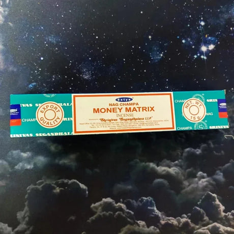Sriyana Money Matrix incense packaging on a dark background