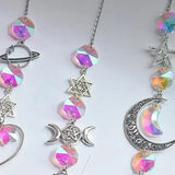 Necklace with colorful beads and silver charms on a white background