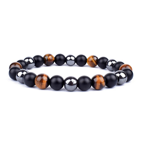 Beaded bracelet with black, brown, and silver beads on a white background