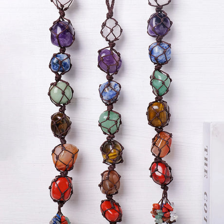 Colorful beaded necklaces on a white background