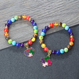 Colorful beaded bracelets with puzzle piece charms on a wooden surface