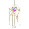 Decorative hanging crystal with gold frame and colorful beads on a white background