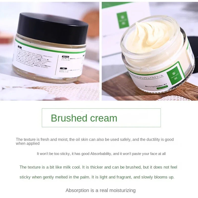 Jar of cream with a green label on a white background