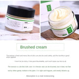 Jar of cream with a green label on a white background