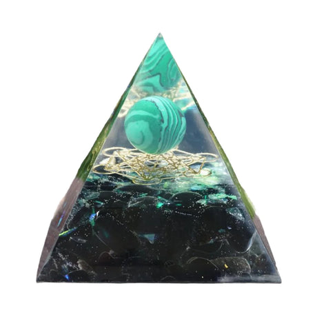 Triangular pyramid with green marbled stone and gold string on a white background
