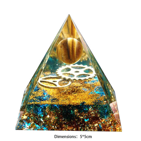 Pyramid-shaped object with gold and blue colors on a white background