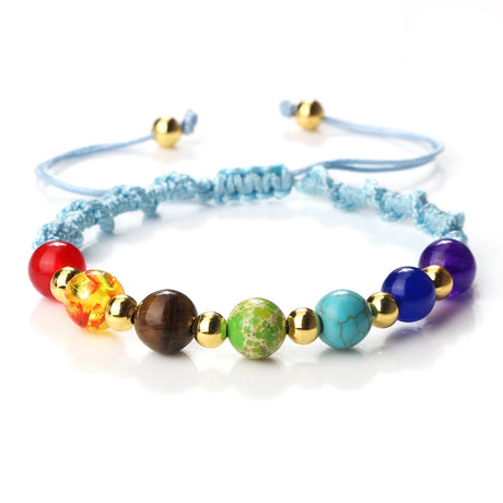 Colorful beaded bracelet with various beads on a white background