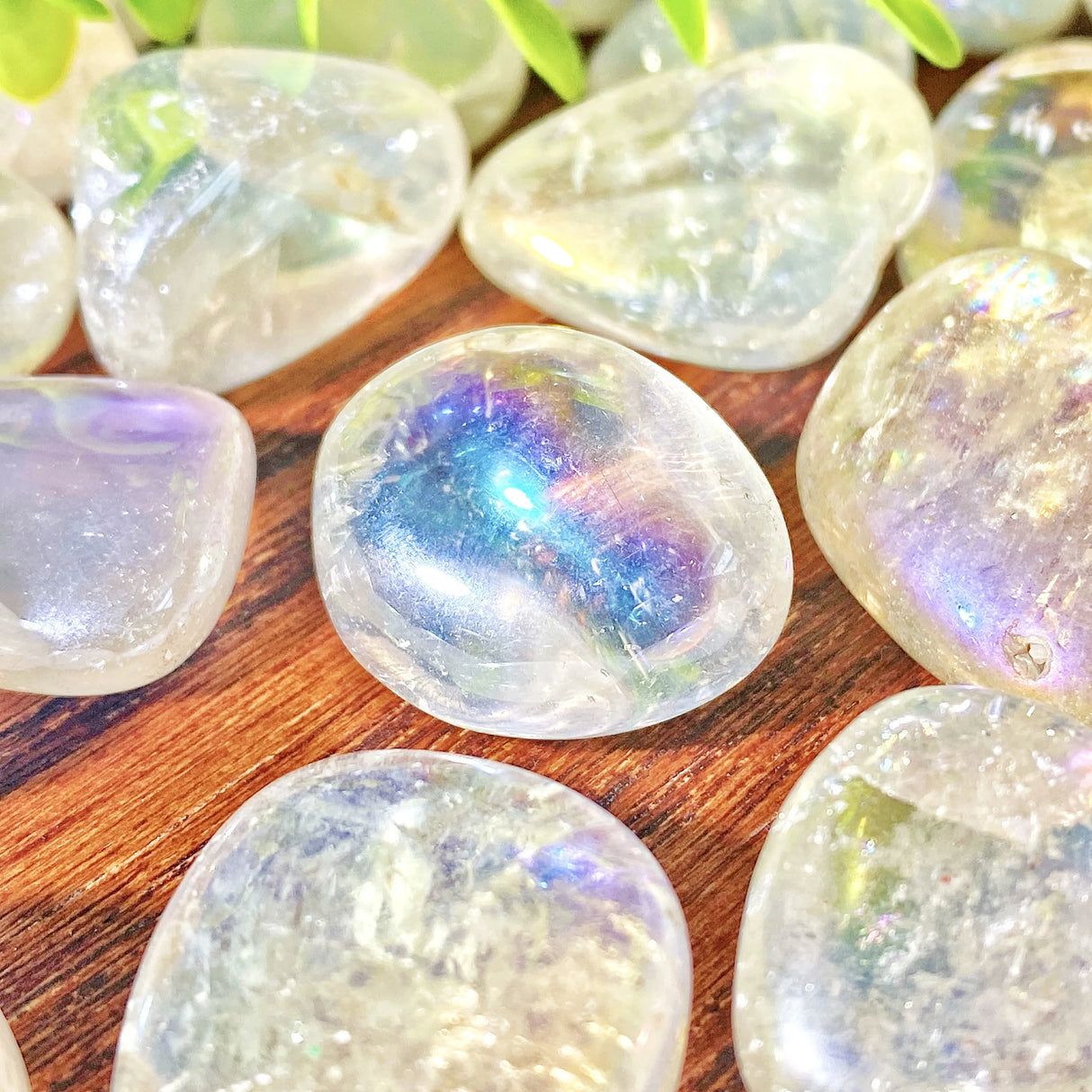 Iridescent stones on a wooden surface