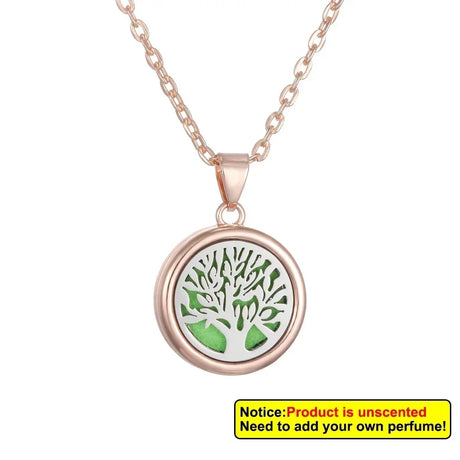 Rose gold necklace with a tree of life pendant on a white background