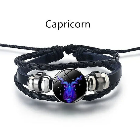 Black braided bracelet with a Capricorn zodiac sign charm on a white background
