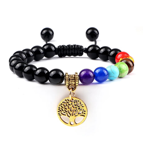 Black beaded bracelet with colorful beads and a gold tree of life charm on a white background