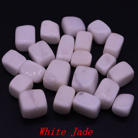 White jade stones on a black background with 'White Jade' text.