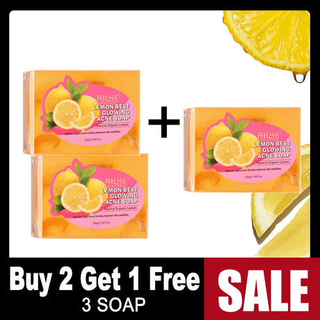 Two boxes of Alke Lemon Best Glowing Acne Soap with a lemon slice on a white background, featuring a buy two get one free offer.