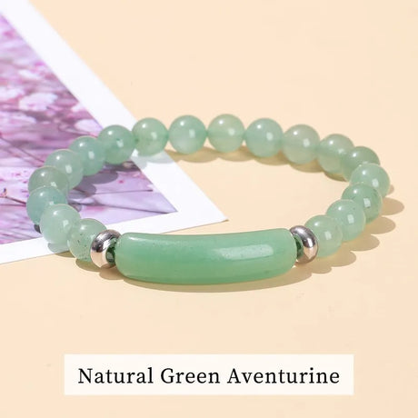 Green aventurine beaded bracelet on a light background with 'Natural Green Aventurine' text.