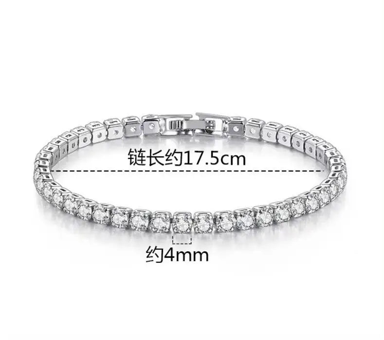 Silver bracelet with clear stones on a white background